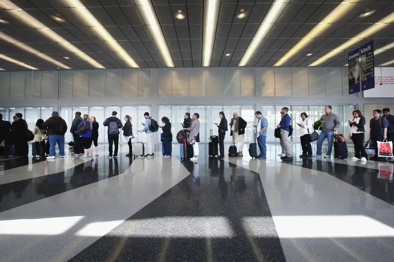 American Airlines will spend $4 million to hire more TSA workers in key locations.