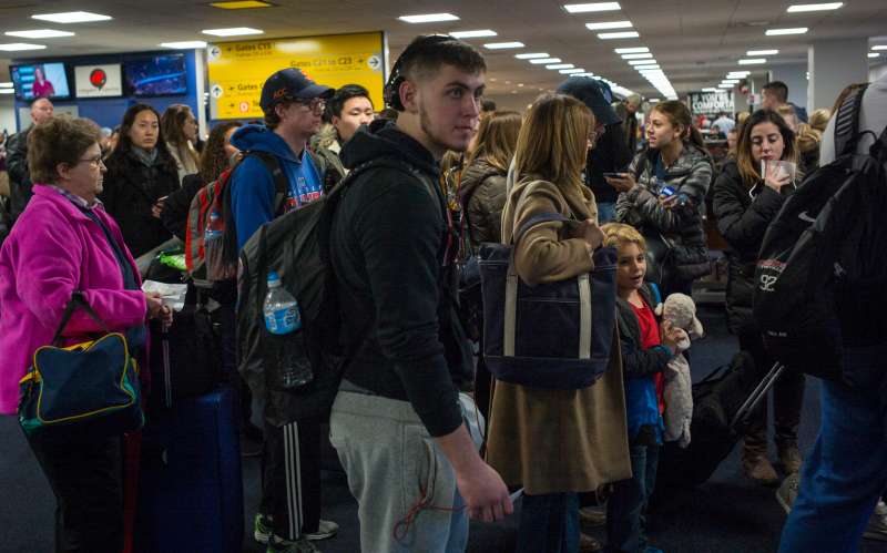 Delta Airlines Passengers Wait To Board Their Flight Over Thanksgiving Holiday