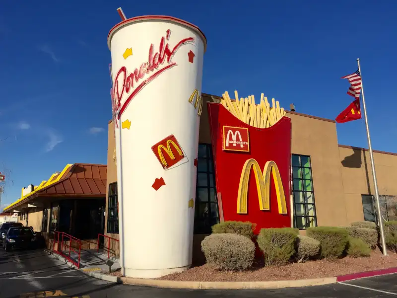 McDonald's plans to test fresh beef patties in 14 locations.