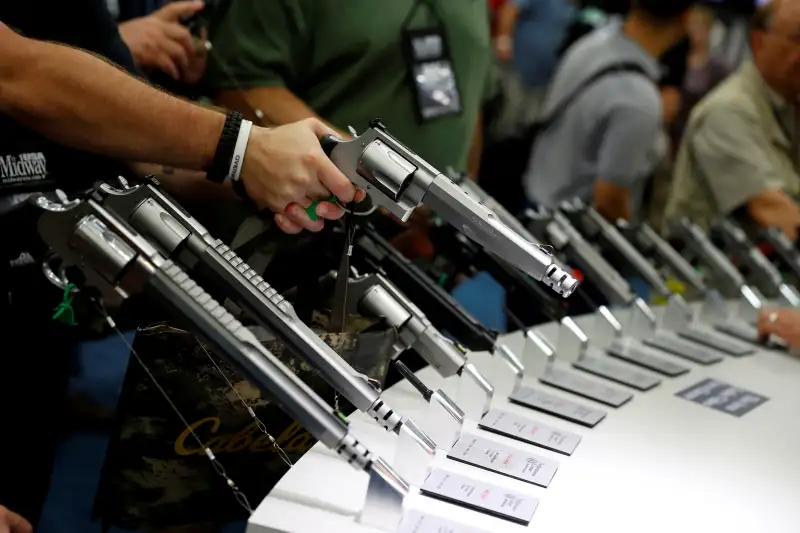 Attendees visit the trade booths during the National Rifle Association's (NRA) annual meeting in Louisville, Kentucky, May 21, 2016.