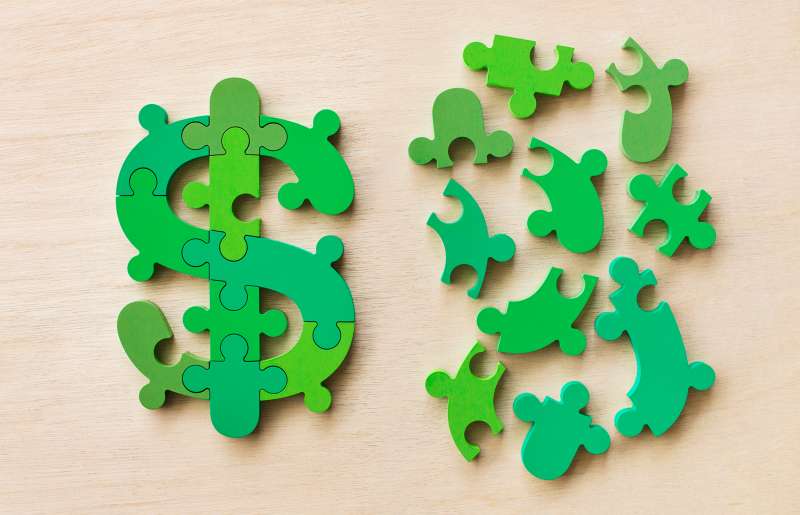 dollar sign wooden puzzle