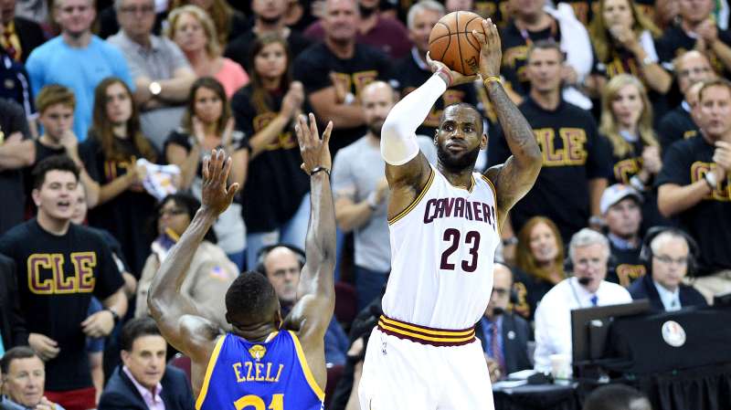 Cleveland Cavaliers forward LeBron James (23) shoots the ball against Golden State Warriors center Festus Ezeli (31) during the third quarter in game six of the NBA Finals at Quicken Loans Arena, June 6, 2016, Cleveland, Ohio.