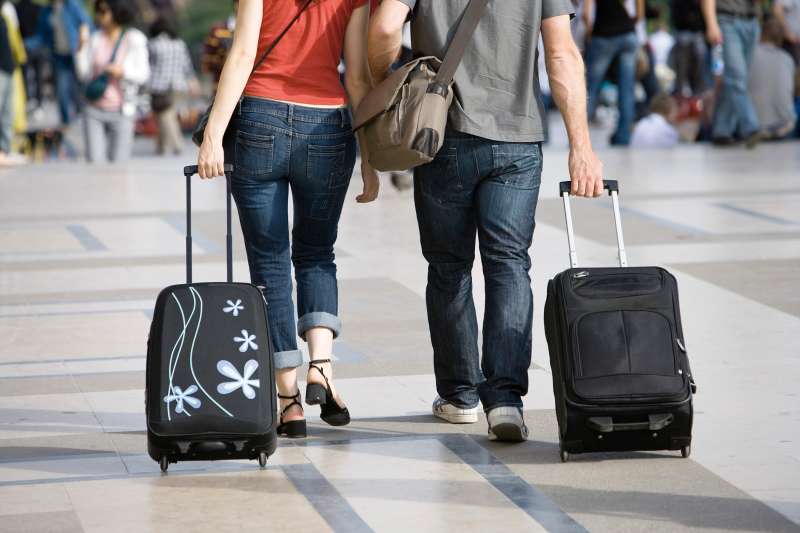 couple with suitcase