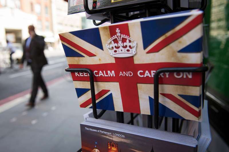 Postcards featuring the World War II British slogan  Keep Calm and Carry On  are seen outside a newsagents in London, on June 24, 2016. 
            Britain voted to break away from the European Union on June 24, toppling Prime Minister David Cameron and dealing a thunderous blow to the 60-year-old bloc that sent world markets plunging.
