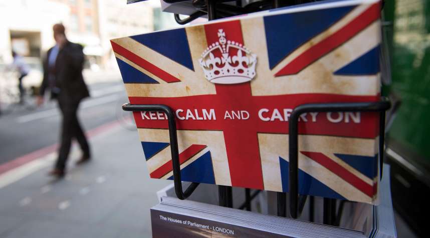 Postcards featuring the World War II British slogan  Keep Calm and Carry On  are seen outside a newsagents in London, on June 24, 2016. 
                      Britain voted to break away from the European Union on June 24, toppling Prime Minister David Cameron and dealing a thunderous blow to the 60-year-old bloc that sent world markets plunging.