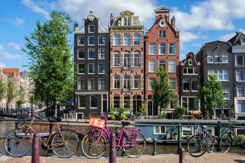 Canal houses and bicycles along Herengracht canal, Amsterdam