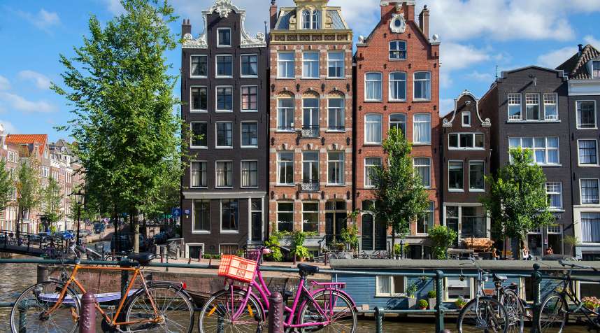 Canal houses and bicycles along Herengracht canal, Amsterdam