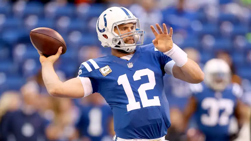 Andrew Luck #12 of the Indianapolis Colts throws a pass before the game against the Denver Broncos at Lucas Oil Stadium on November 8, 2015 in Indianapolis, Indiana.