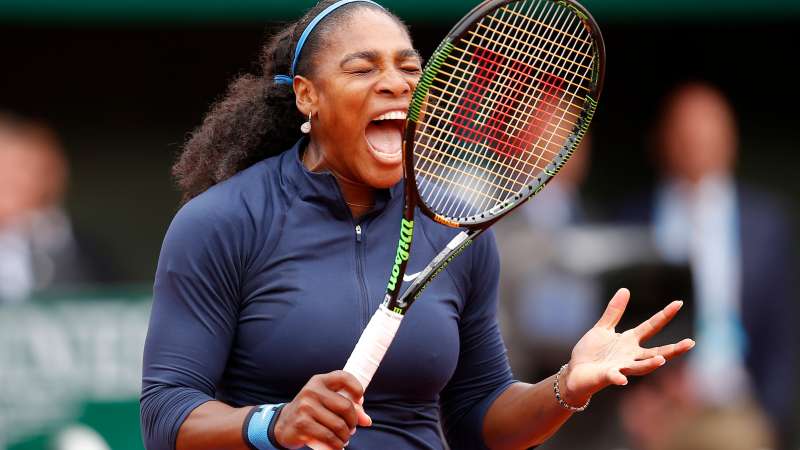 Serena Williams of the U.S. shouts as she plays Spain's Garbine Muguruza during their final match of the French Open tennis tournament at the Roland Garros stadium, Saturday, June 4, 2016 in Paris.