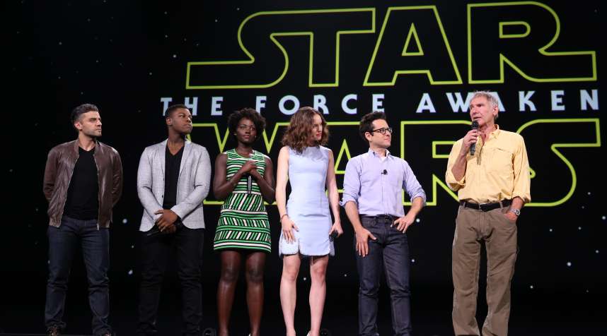 ANAHEIM, CA - AUGUST 15:  (L-R) Actors Oscar Isaac, John Boyega, Lupita Nyong'o, Daisy Ridley, director J.J. Abrams and actor Harrison Ford of  Star Wars: The Force Awakens.