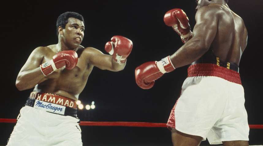NASSAU - DECEMBER 11: Muhammad Ali throws a left hook and misses Trevor Berbick at the Queen Elizabeth Sports Centre on December 11, 1981 in Nassau, Bahamas.  Berbick defeated Ali in the tenth round. (Focus on Sport/Getty Images)