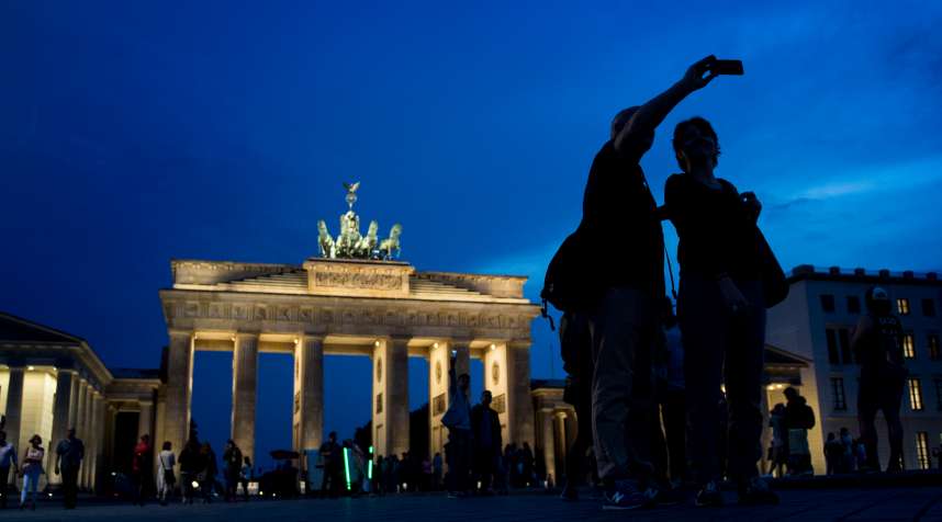 Tourists in front of the Brandenburg Gate in Berlin
