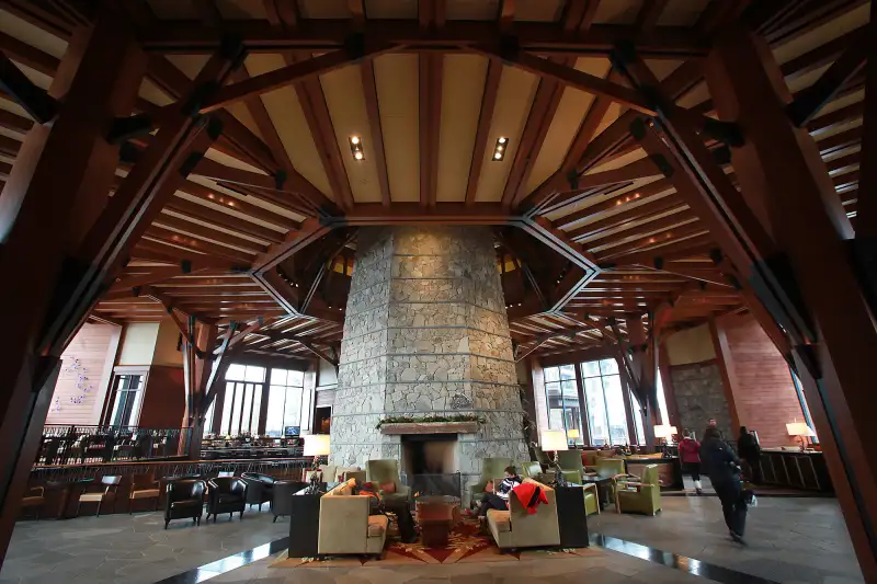 SOUTH LAKE TAHOE- NOVEMBER 16 2012: Cozy seating areas surround the stone fireplace column at the Ri