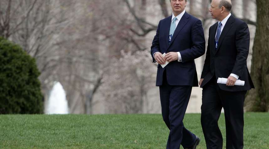 Goldman Sachs CEO Lloyd Blankfein (r) walks with JP Morgan CEO Jamie Dimon after meeting with President Obama in 2009.