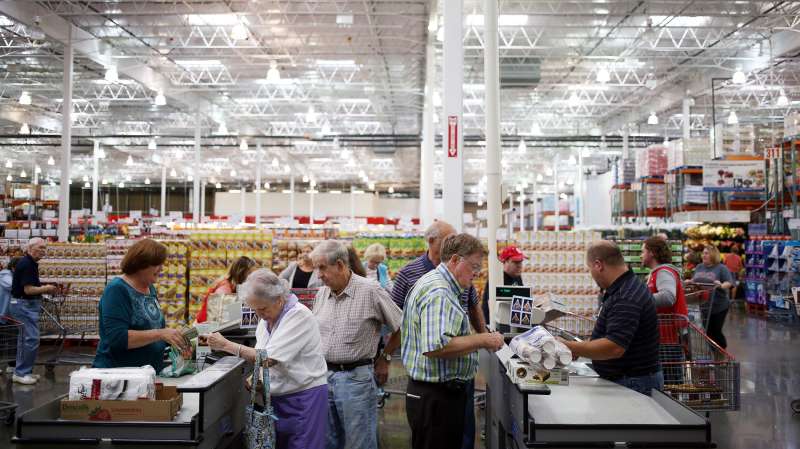Customers stand at check out counters after shopping inside a Costco Wholesale Corp. store in Nashville, on Sept. 25, 2015.