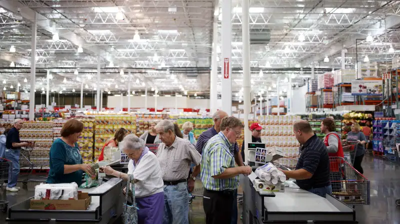 Customers stand at check out counters after shopping inside a Costco Wholesale Corp. store in Nashville, on Sept. 25, 2015.