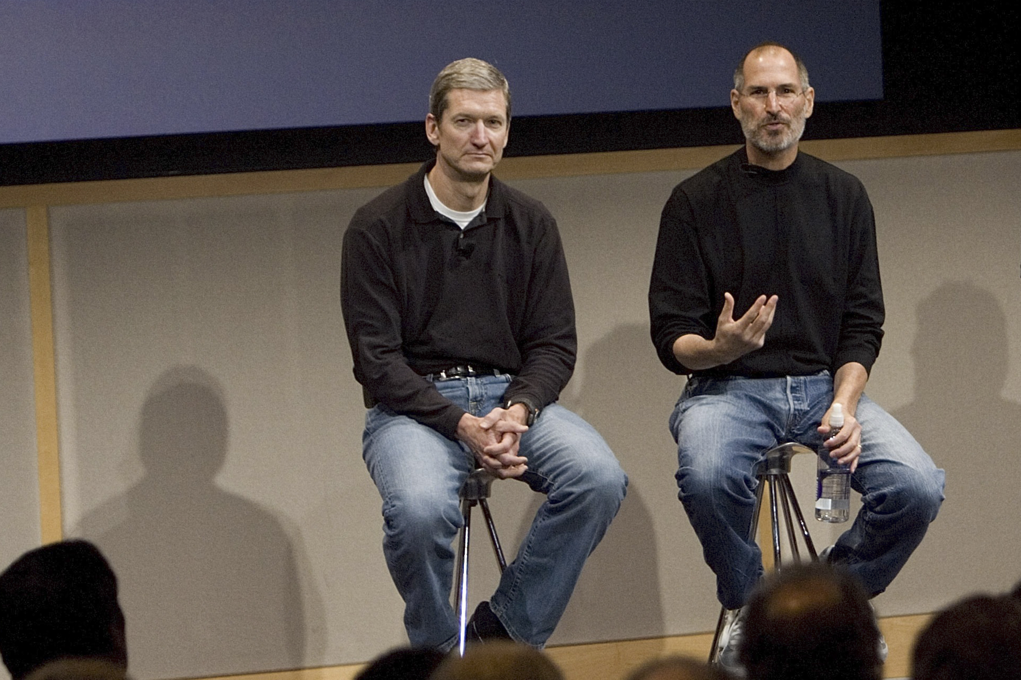 C(L-R) Tim Cook, Chief Operating Officer, Apple CEO Steve Jobs and Phil Schiller, EVP Product Marketing, answers questions after Jobs introduced new versions of the iMac and iLife applications August 7, 2007 in Cupertino, California.