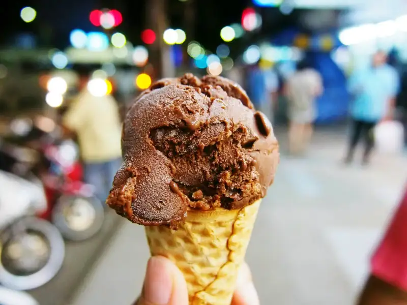 ice cream cone with chocolate ice cream on it