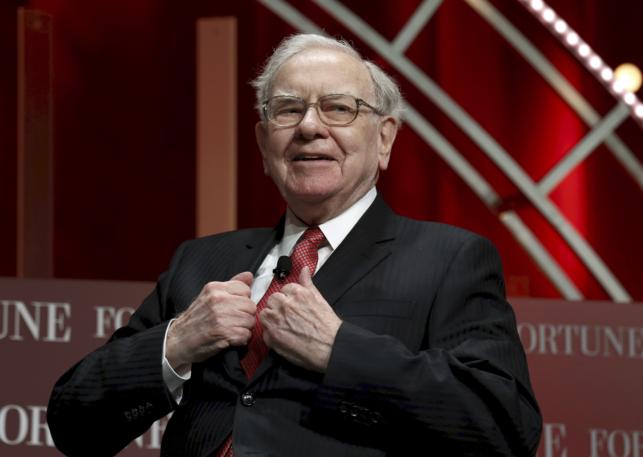 Warren Buffett, chairman and CEO of Berkshire Hathaway, takes his seat to speak at the Fortune's Most Powerful Women's Summit in Washington October 13, 2015.