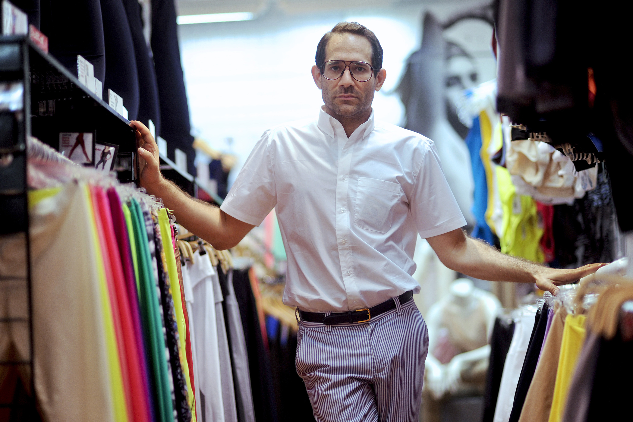 Dov Charney, chairman and chief executive officer of American Apparel Inc., stands for a portrait in a company retail store in New York, U.S., on Thursday, July 29, 2010. Starting the company in a dorm at Tufts University in Medford, Massachusetts, Charney built a worldwide empire of 280 clothing stores by leaping out ahead of mainstream fashion. He personified the racy, risk-taking aesthetics of his business and is now facing the consequences - skittish lenders and investors who doubt his ability to oversee his own creation.