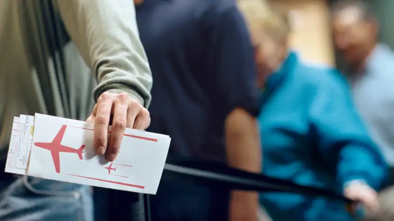 waiting in line with boarding pass