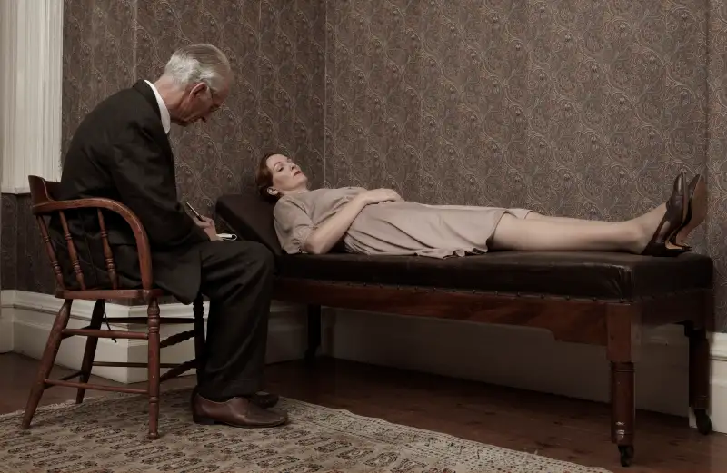 Psychologist listening to female patient