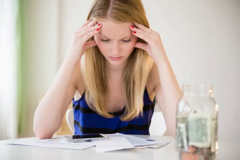 Woman frustrated with bills