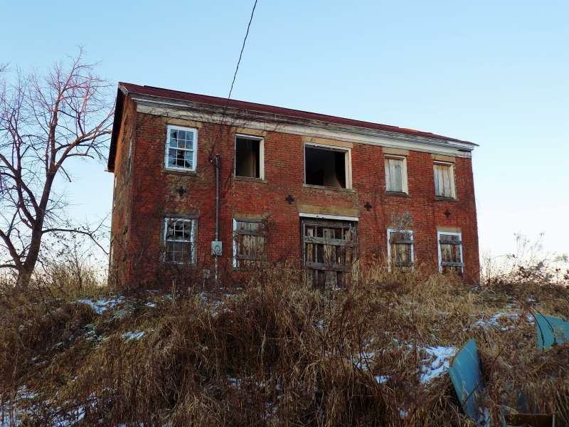 Abandoned brick home