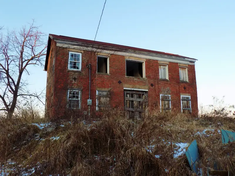 Abandoned brick home