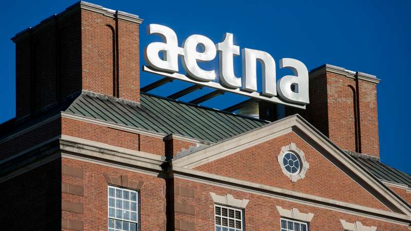 A logo sign outside of the headquarters of Aetna, Inc., in Hartford, Connecticut on November 21, 2015.