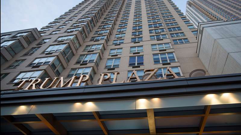 The Trump Plaza Residence building, left, stands next to Trump Bay Tower under construction in Jersey City, New Jersey, U.S., on Saturday, March 5, 2016. Trump Bay Street is a 50-story luxury rental apartment building being built by Kushner Companies, whose chief executive officer, Jared Kushner, is married to Donald Trump's daughter Ivanka. It will have an outdoor pool, indoor golf simulator and sweeping views of Lower Manhattan; it adjoins an existing high rise condo, Trump Plaza Residence.
