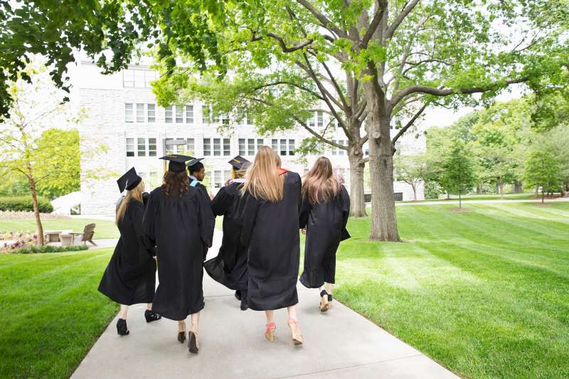 College graduates walking