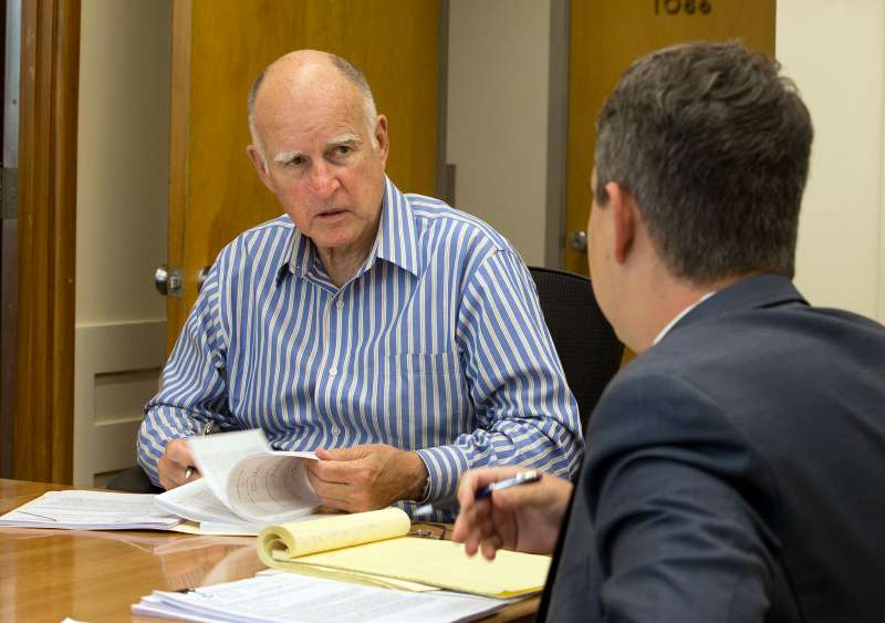 The California Secure Choice plan is expected to be signed into law by Gov. Jerry Brown, at left in his office.