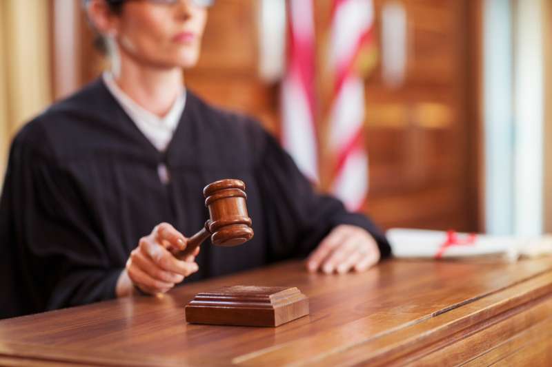 Judge banging gavel in court