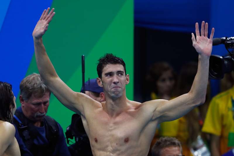 Michael Phelps of the United States thanks the crowd after winning gold in the Men's 4 x 100m Medley Relay Final on Day 8 of the Rio 2016 Olympic Games at the Olympic Aquatics Stadium on August 13, 2016 in Rio de Janeiro, Brazil.