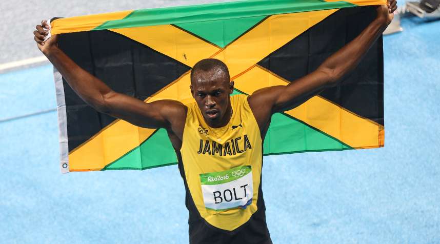Usain Bolt of Jamaica celebrates winning the gold medal in the Men's 200m Final of the Rio 2016 Olympic Games at the Olympic Stadium in Rio de Janeiro, Brazil on August 18, 2016.