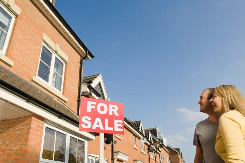 Couple looking at house for sale