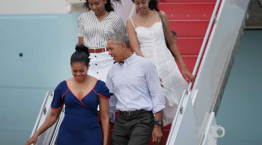 President Barack Obama, First Lady Michelle Obama, and their daughters, Sasha, back left, and Malia, step off Air Force One at Joint Base Cape Cod to take Marine One to Martha's Vineyard for a vacation, on Aug. 6, 2016.