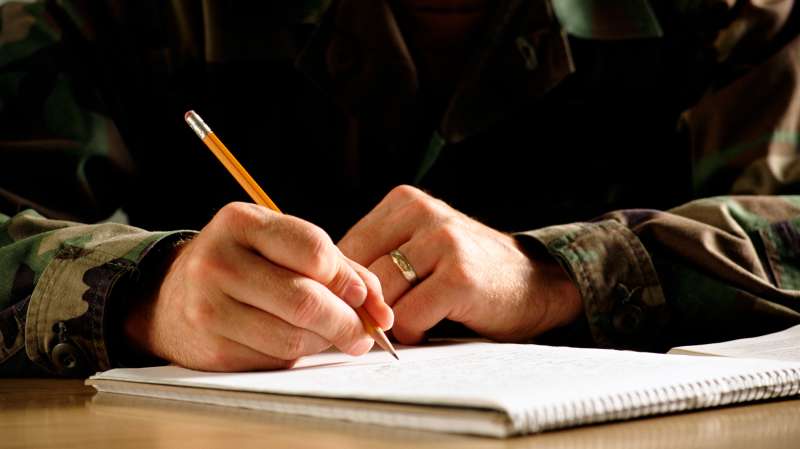 military person writing