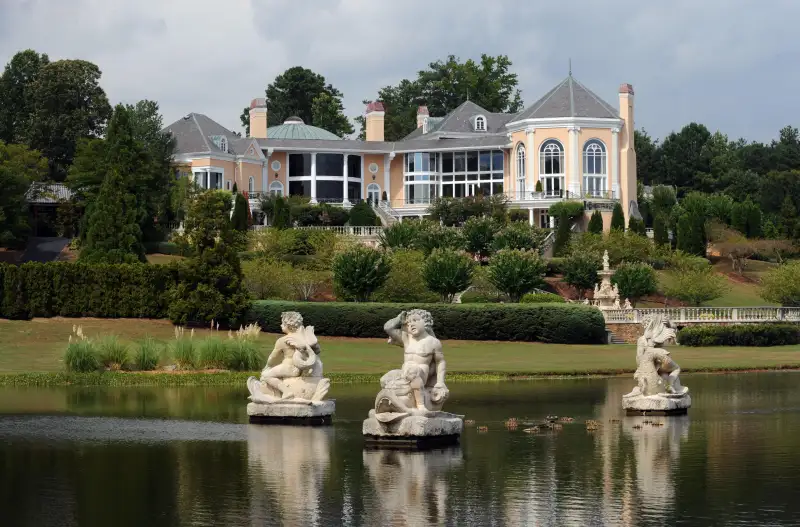 160914_BPL_Richest_JohnsCreek Larry Dean's ornate former mansion in Johns Creek, Georgia on Thursday August 19, 2010. It is reported that actor director Tyler Perry purchased the 58-acre estate which was asking 3.9 million, down from a high of 2 million.