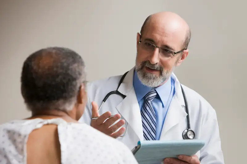 doctor talking to patient