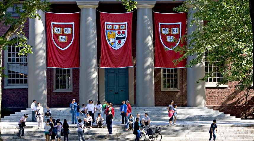 Harvard banners hang outside Memorial Church on the Harvard University campus in Cambridge, Massachusetts.