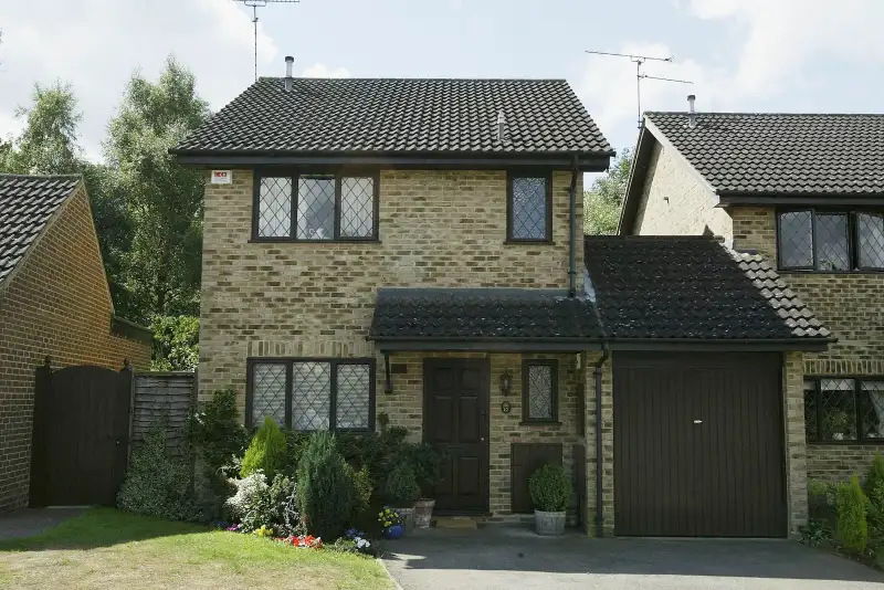 BRACKNELL, ENGLAND - JULY 22:  A general view of the house where Harry Potter lived in the Warner Brothers film 'Harry Potter and the Philosopher's Stone' on July 22, 2003 in Bracknell, England. The house is scheduled to be sold at auction today by Savills in London at a guide price of GBP 250,000. The three-bedroom detached house which is featured in the film as 4 Privet Drive, Little Whingeing, Surrey is in real life located at 12 Picket Close Bracknell, south-east England. (Photo by Warren Little/Getty Images)