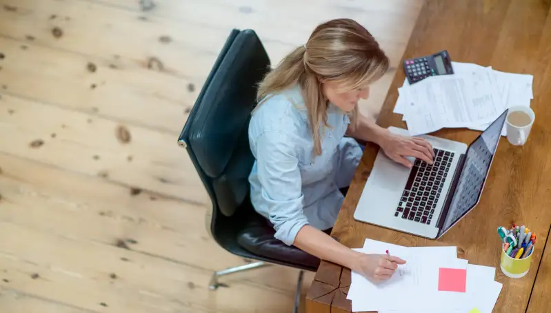 Woman doing her home finances