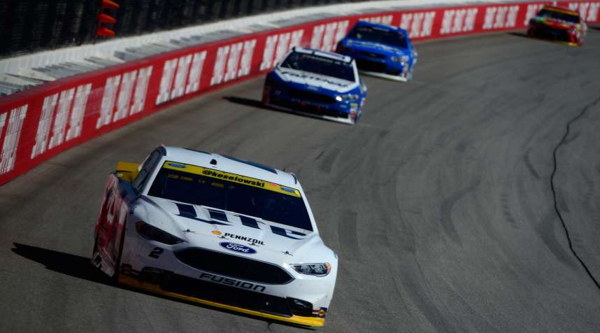 Brad Keselowski, driver of the #2 Miller Lite Ford, races during the NASCAR Sprint Cup Series Teenage Mutant Ninja Turtles 400 at Chicagoland Speedway on September 18, 2016 in Joliet, Illinois.