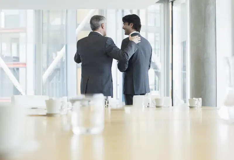 Businessmen talking in meeting