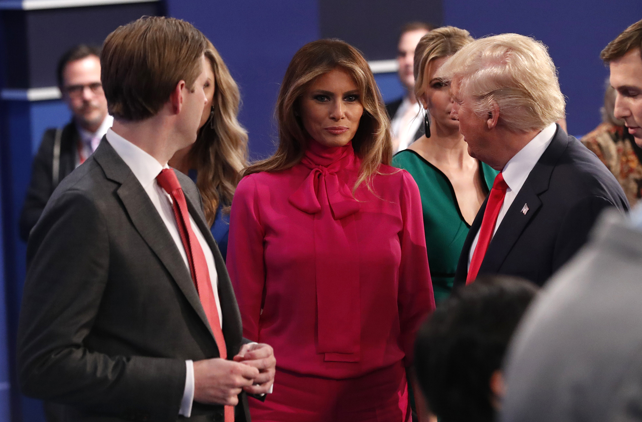 Republican U.S. presidential nominee Donald Trump talks with his son Eric (L), wife Melania (C) and daughter Ivanka (R, rear) at the conclusion of the debate with Democratic U.S. presidential nominee Hillary Clinton at Washington University in St. Louis, October 9, 2016.
