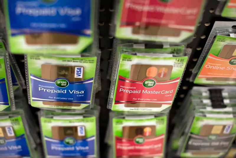 Prepaid MasterCard Inc. and Visa Inc. gift cards are displayed for sale at a Kroger Co. store in Peoria, Illinois, on Tuesday, June 16, 2015.