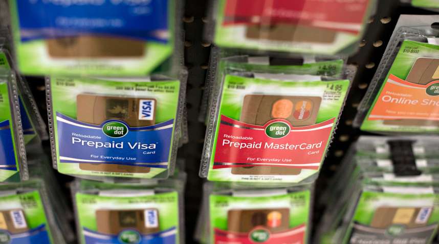 Prepaid MasterCard Inc. and Visa Inc. gift cards are displayed for sale at a Kroger Co. store in Peoria, Illinois, on Tuesday, June 16, 2015.
