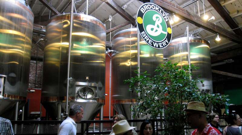 This June 25, 2011 photo shows visitors sampling beer at the Brooklyn Brewery in the Brooklyn borough of New York. The brewery is located in a 150-year-old factory in Williamsburg, a working-class section of Brooklyn with a gritty industrial past that has become popular among hipsters and is starting to attract tourists. The brewery also offers weekend tours that attract visitors from around the world.
